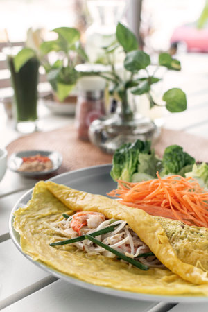 Banh xeo traditional food pancake crepe with pork and saladの写真素材
