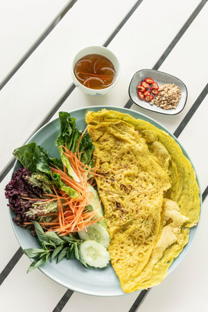 Banh xeo vietnamese traditional food pancake crepe with pork and salad in Da Nang Vietnamの写真素材