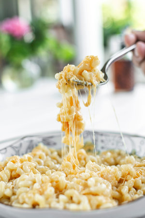 mac and cheese classic australian food on white table in melbourne australia restaurant outdoor