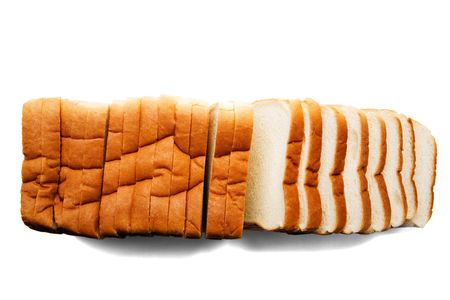 Fresh bread slices isolated over whiteの写真素材