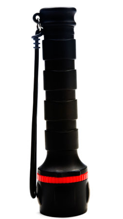 Close-up of a flashlight isolated over white