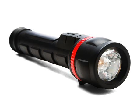 One flashlight isolated over whiteの写真素材