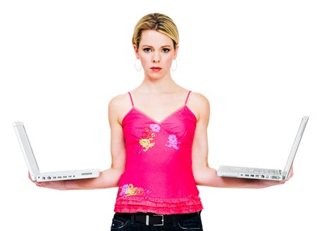 Caucasian mid adult woman holding laptops isolated over whiteの写真素材