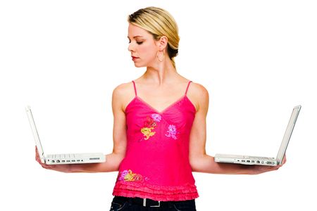 Fashion model holding laptops isolated over whiteの写真素材