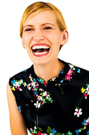 Laughing young woman posing isolated over whiteの写真素材