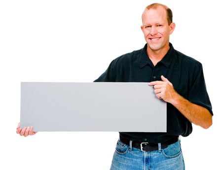 Confident man showing a placard isolated over whiteの写真素材