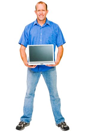 Happy man showing a laptop isolated over whiteの写真素材