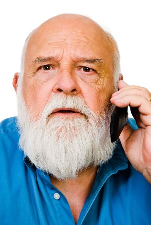 Caucasian man talking on a mobile phone isolated over whiteの写真素材