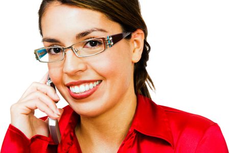 Happy woman talking on a mobile phone isolated over whiteの写真素材