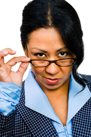 Woman wearing eyeglasses and smiling isolated over whiteの写真素材