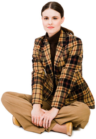 Confident woman posing and smirking isolated over whiteの写真素材