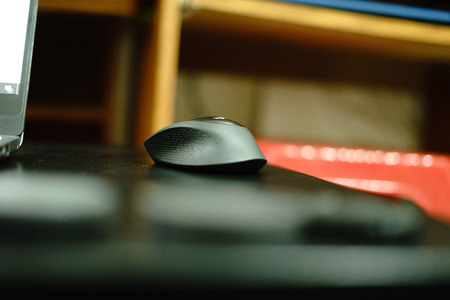High technology computer working mouse : Professional wireless  Mouse on black background ; hight contrastの写真素材