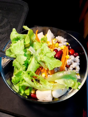 Fresh mixed vegetables salad and bright colors to eat.の写真素材