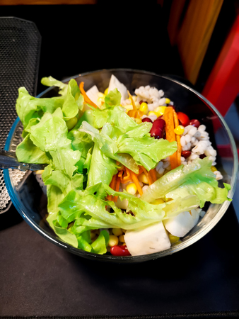 Fresh mixed vegetables salad and bright colors to eat.の写真素材