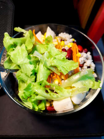 Fresh mixed vegetables salad and bright colors to eat.の写真素材