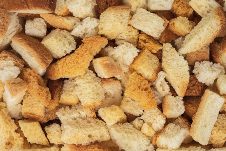 background of croutons, food close-up, top viewの写真素材