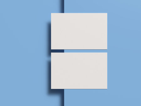Blank business cards mockup on blue background. 3D renderingの写真素材