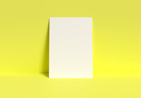 A4 blank paper on yellow background. 3d renderの写真素材