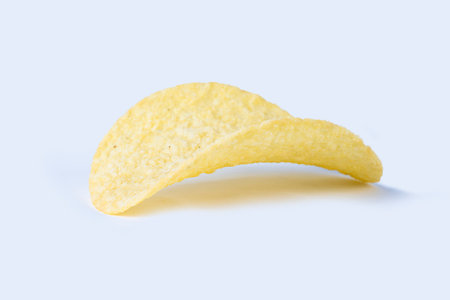 single potato chip with shadow. High quality photoの写真素材