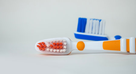 close up view of pair of colored toothbrushes. High quality photoの写真素材