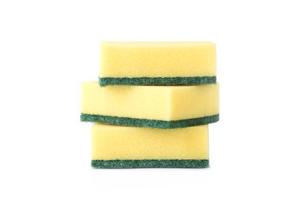 Yellow and green scrub sponge for dish washing isolatedの写真素材
