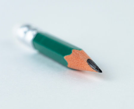 sharpened colored pencil is displayed with the tip in focusの写真素材