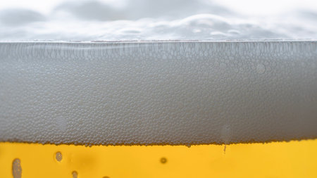 Close up of beer bubbles in a chilled glass. High quality photoの写真素材