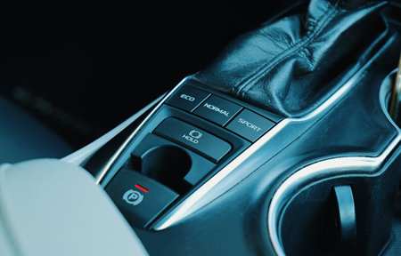 Close up view of a cars drive mode selector with various settings visibleの写真素材