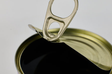 Metal can with a pop-top lid partially open. High quality photoの写真素材