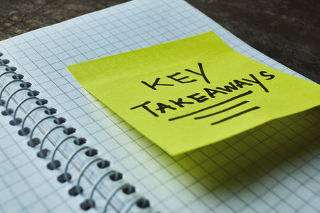 Sticky note highlights important points on a notebook page