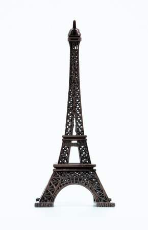 Small Eiffel Tower model showcases intricate design. High quality photoの写真素材