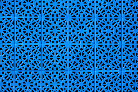 Blue decorative wall pattern in urban setting.の写真素材