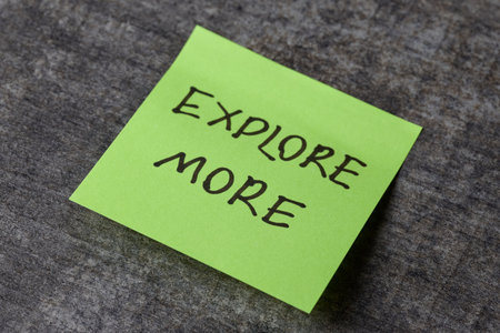 Green sticky note sparks exploration and discovery.の写真素材