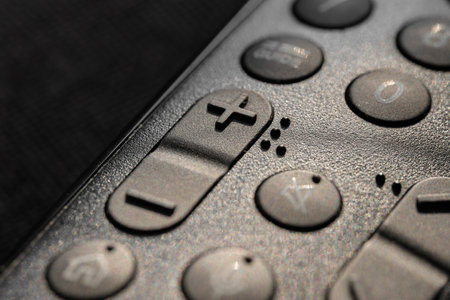 Close view of a remote control with numbers and buttons. High quality photoの写真素材