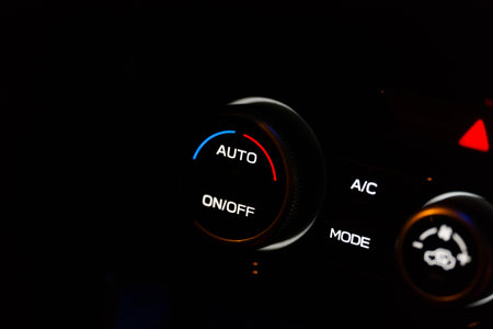 Close-up of Modern Car Interior Climate Control Panel and Air Conditioning Buttons. High quality photoの写真素材