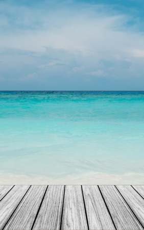 Wood Terrace on The Beach with Clear Sky and Blue Seaの写真素材