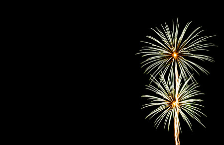 Abstract Sparkling Fireworks Light up The Sky with Dazzling Display at The Corner with Copyspace to input Textの写真素材