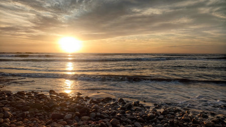 Sunset over the sea in the evening. Beautiful seascape.の写真素材