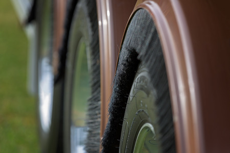 A close up of the wheels of a truck in abstractの写真素材