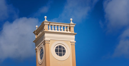 The turret of a town hall building in a small Australian town, isolated against the blue sky