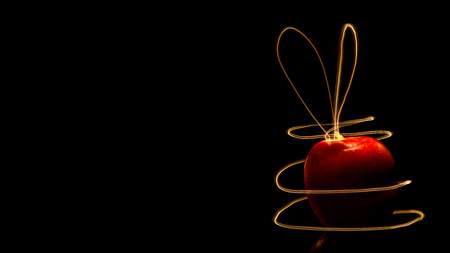 Light painted red apple card with copy space for business advertisement, corporate or personal greetingの写真素材