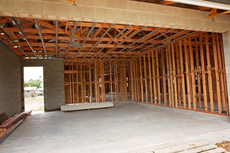 Timber frame work for the garage space of a residential home being built in suburbiaの写真素材
