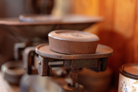 Vintage weights for weighing produce in a shopの写真素材