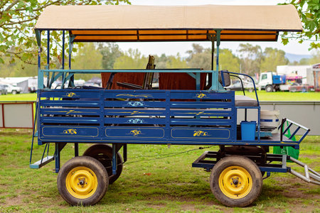 Colorful vintage wagon for transporting passengers to and from a festival in Australia