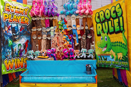 MACKAY, QUEENSLAND, AUSTRALIA - JUNE 16TH 2019: Sideshow game attraction to win a soft toy at...