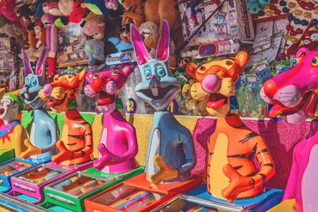 MACKAY, QUEENSLAND, AUSTRALIA - JUNE 2019: A game of chance putting balls into animals mouths at Mackay Annual Showのeditorial素材