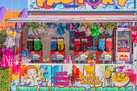 MACKAY, QUEENSLAND, AUSTRALIA - JUNE 2019: A stall selling drinks in sideshow alley at Mackay Annual Showのeditorial素材