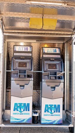 Mackay, Queensland, Australia - 12th July 2019: Automated teller machines in mobile trailer at local city twilight marketsのeditorial素材