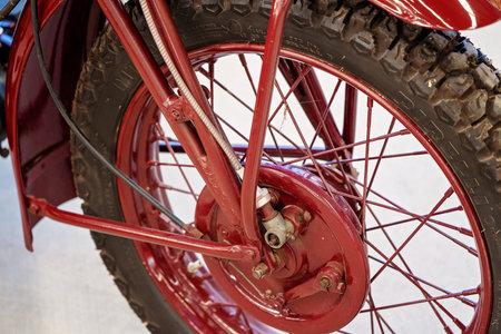 MACKAY, QUEENSLAND, AUSTRALIA - 13th July 2019: Close up of the wheel and spokes of a custom classic...