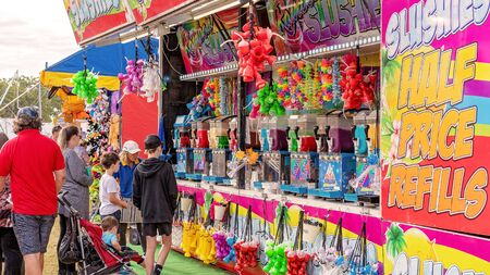 SARINA, QUEENSLAND, AUSTRALIA - AUGUST 2019: Flavored drinks stall at Sarina country showのeditorial素材